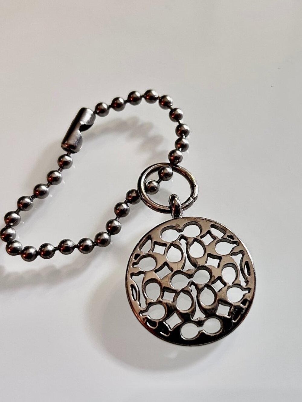 COACH 1" VTG Hang Tag Fob Bag Charm Round Silver Metal Logo Monogram Rare Shiny